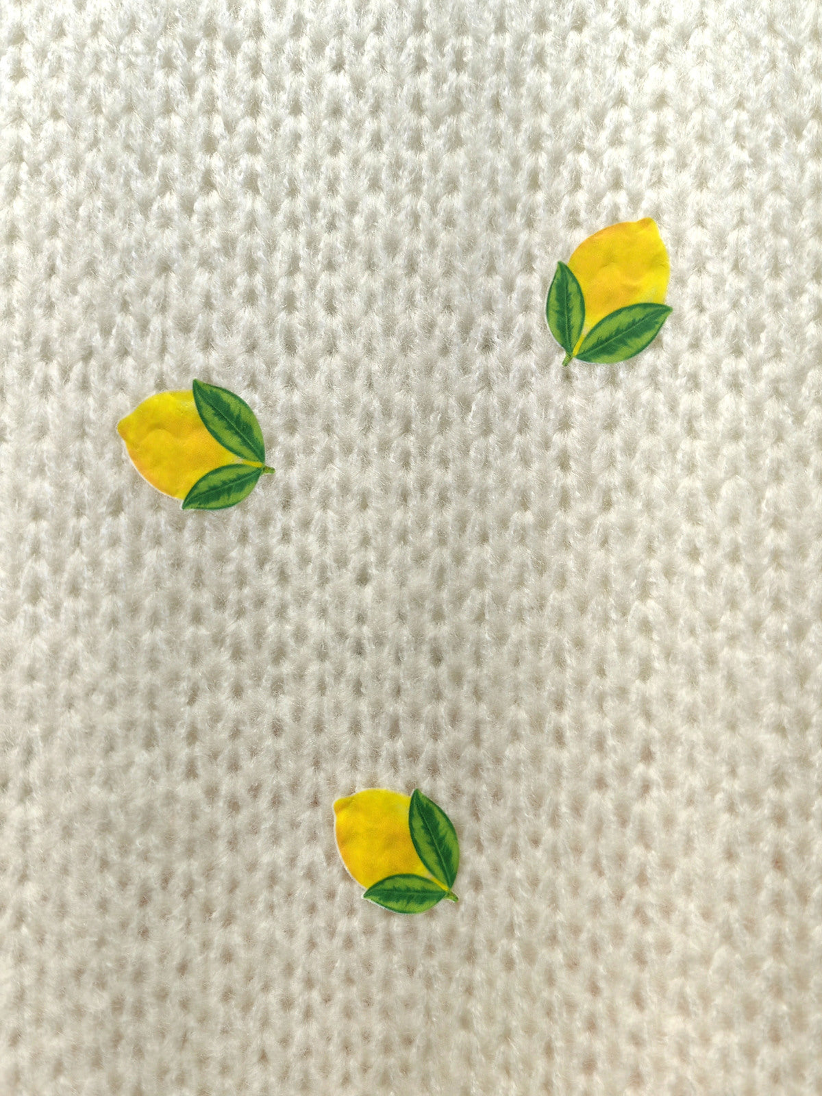 Pull en maille à motifs fruits